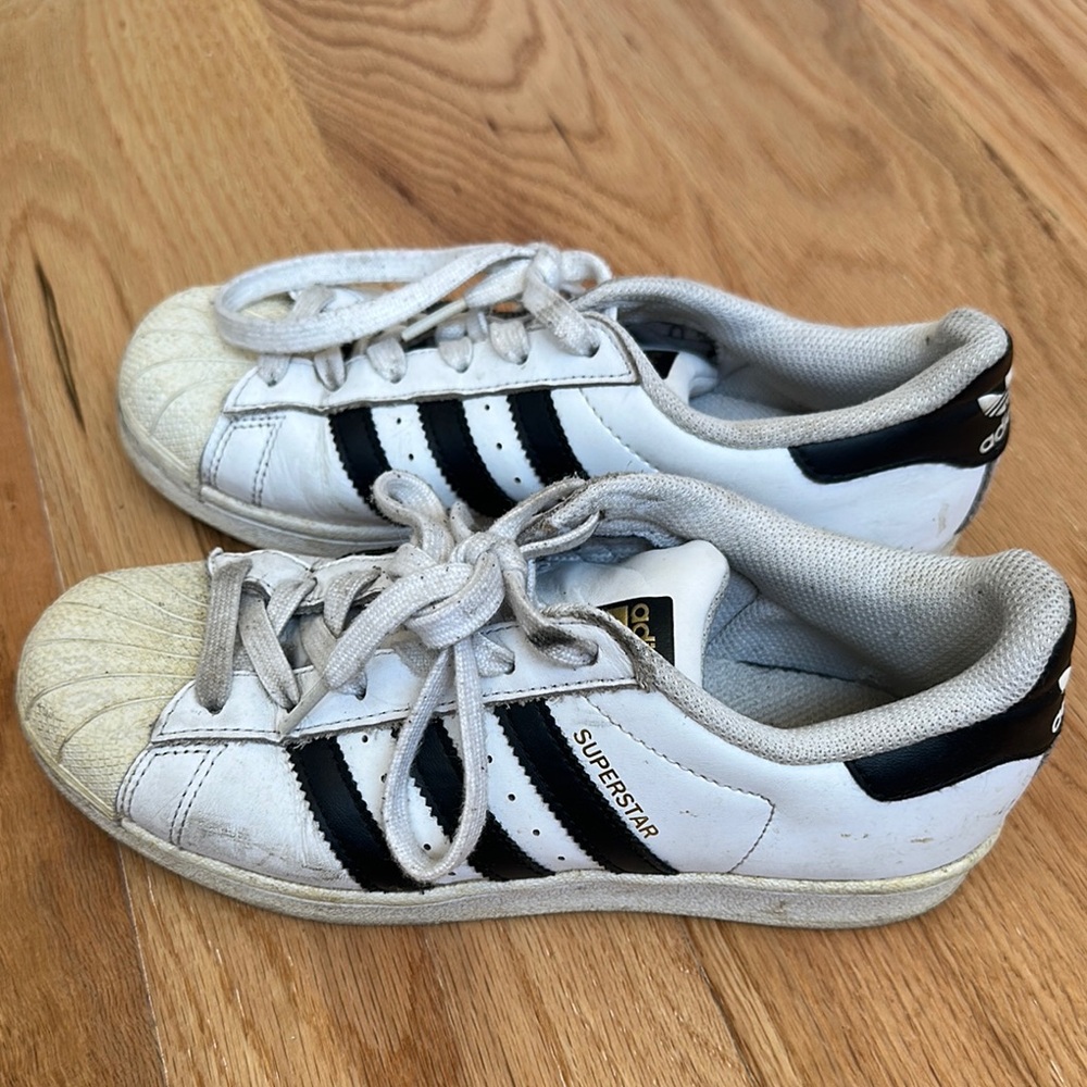 Adidas White and Black Sneakers with Iconic Shell Toe